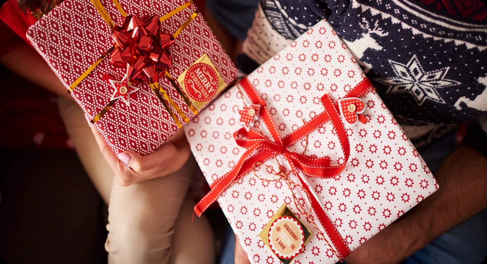 People exchanging wrapped gifts